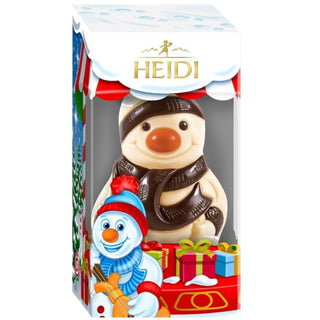 Snowman figurine in a decorative box with 'HEIDI' branding on a white background